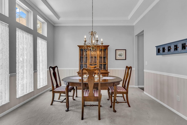 180 Locust Curve Dr, Delaware, OH 43015 - dining room with light colored carpet, a chandelier, ornamental molding, and a raised ceiling