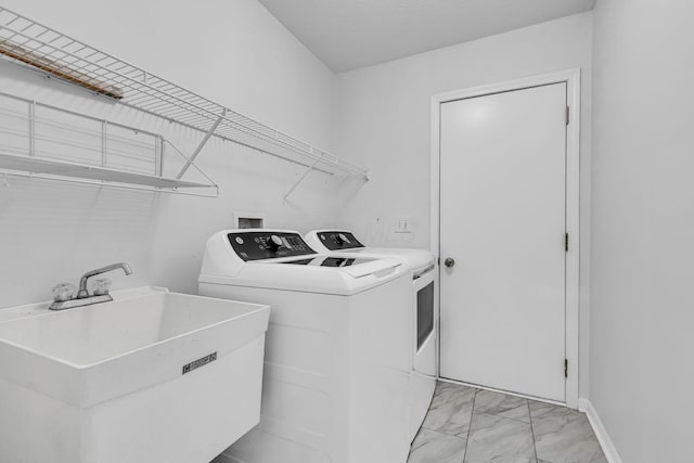 180 Locust Curve Dr, Delaware, OH 43015 - laundry room with light marble finish floors and independent washer and dryer