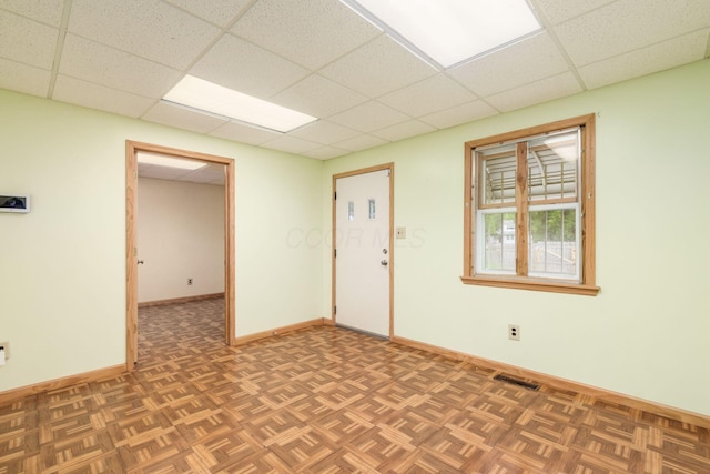 2969 Grasmere Ave, Columbus, OH 43224 - empty room featuring a paneled ceiling and baseboards