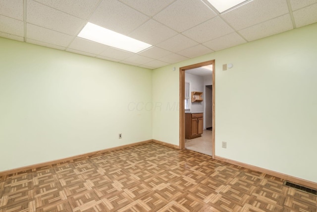 2969 Grasmere Ave, Columbus, OH 43224 - empty room featuring a drop ceiling