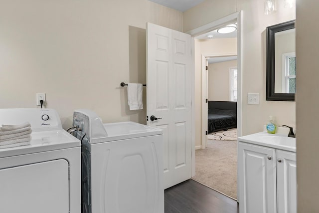 185 S Princeton Ave, Columbus, OH 43223 - laundry room featuring cabinet space, independent washer and dryer, and dark wood-type flooring