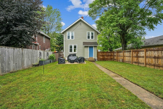 745 W Rich St, Columbus, OH 43222 - back of property featuring entry steps and a fenced backyard