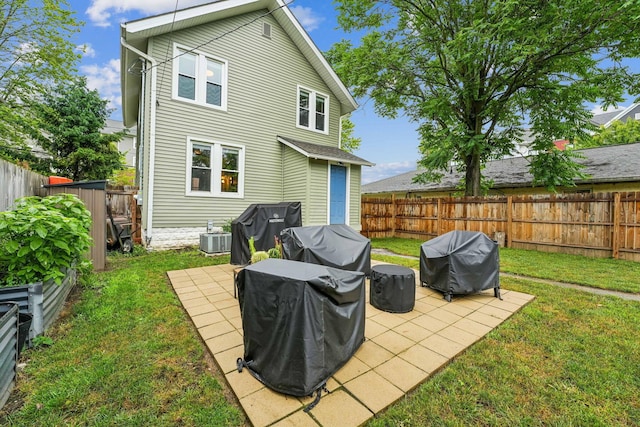 745 W Rich St, Columbus, OH 43222 - rear view of house featuring a patio area and a fenced backyard