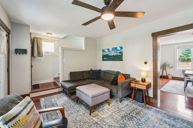 745 W Rich St, Columbus, OH 43222 - living area with wood finished floors, healthy amount of natural light, a ceiling fan, and stairway