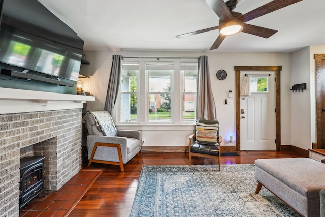 745 W Rich St, Columbus, OH 43222 - living room with a fireplace, ceiling fan, and wood finished floors