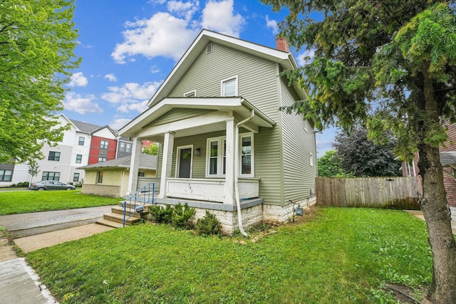745 W Rich St, Columbus, OH 43222 - view of front of home featuring covered porch and a chimney