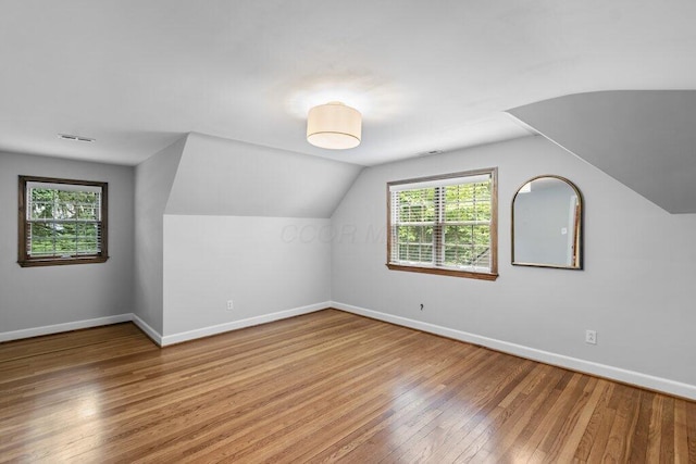 116 W Royal Forest Blvd, Columbus, OH 43214 - bonus room with hardwood / wood-style floors and lofted ceiling