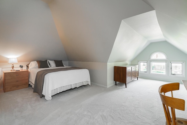 1734 W 1st Ave, Grandview, OH 43212 - bedroom with light carpet and vaulted ceiling