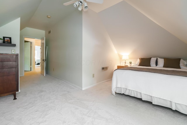 1734 W 1st Ave, Grandview, OH 43212 - bedroom with vaulted ceiling, light carpet, and ceiling fan