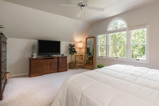 1734 W 1st Ave, Grandview, OH 43212 - bedroom with vaulted ceiling, light colored carpet, and a ceiling fan