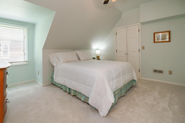 1734 W 1st Ave, Grandview, OH 43212 - bedroom featuring lofted ceiling, light carpet, a closet, and ceiling fan