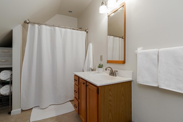1734 W 1st Ave, Grandview, OH 43212 - bathroom with vanity, lofted ceiling, and a shower with curtain