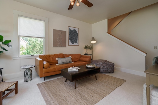 1734 W 1st Ave, Grandview, OH 43212 - living area with carpet, a ceiling fan, and stairs