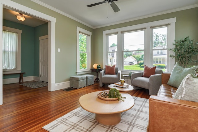 1734 W 1st Ave, Grandview, OH 43212 - living area featuring crown molding, plenty of natural light, wood finished floors, and ceiling fan
