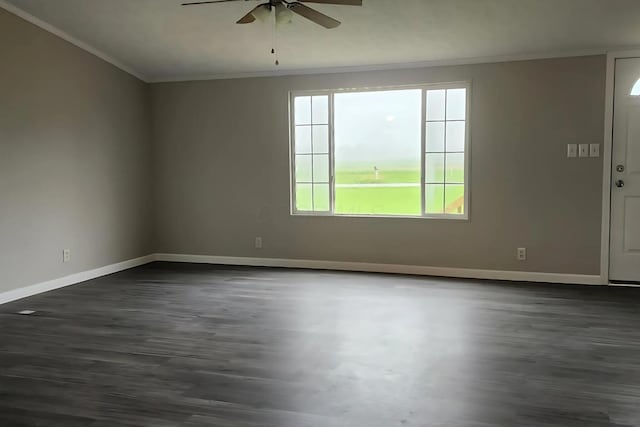 6447 Scioto Farms Rd Unit Se, Washington Court House, OH 43160 - spare room featuring a ceiling fan, crown molding, plenty of natural light, and dark wood-style floors