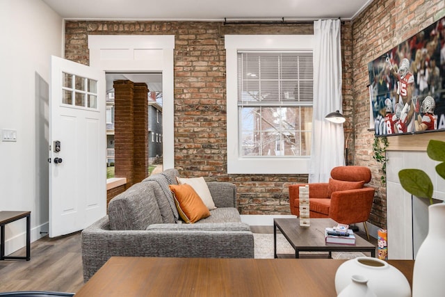 887-891 S 22nd St, Columbus, OH 43206 - living room with wood finished floors and brick wall