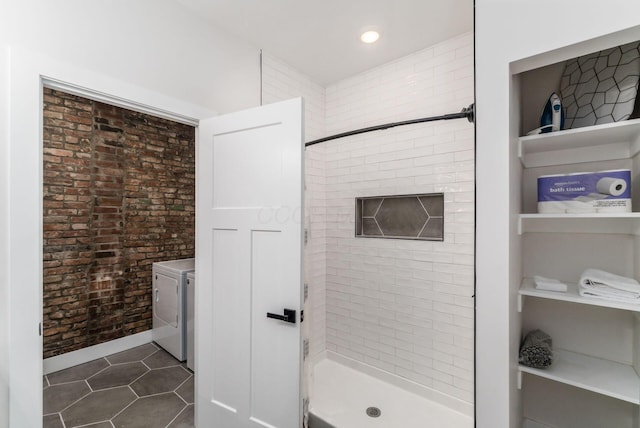 887-891 S 22nd St, Columbus, OH 43206 - bathroom featuring a stall shower, tile patterned flooring, washing machine and dryer, brick wall, and recessed lighting