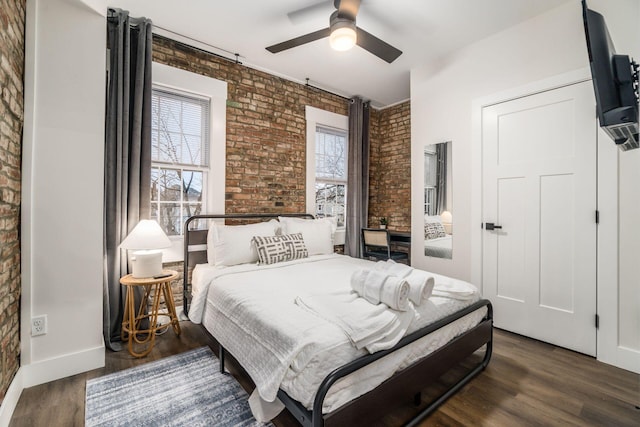 887-891 S 22nd St, Columbus, OH 43206 - bedroom featuring brick wall, dark wood-style flooring, and ceiling fan