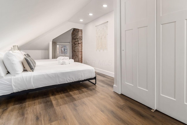 887-891 S 22nd St, Columbus, OH 43206 - bedroom with dark wood-style floors, recessed lighting, and lofted ceiling