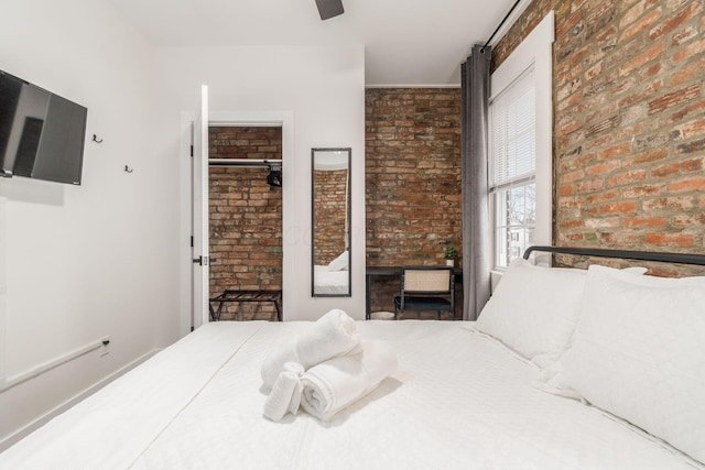 887-891 S 22nd St, Columbus, OH 43206 - bedroom featuring brick wall and ceiling fan