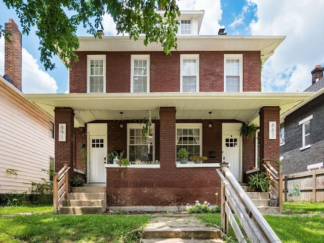 887-891 S 22nd St, Columbus, OH 43206 - view of front of home featuring a porch and brick siding