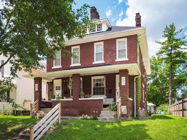 887-891 S 22nd St, Columbus, OH 43206 - traditional style home featuring a chimney, covered porch, and brick siding
