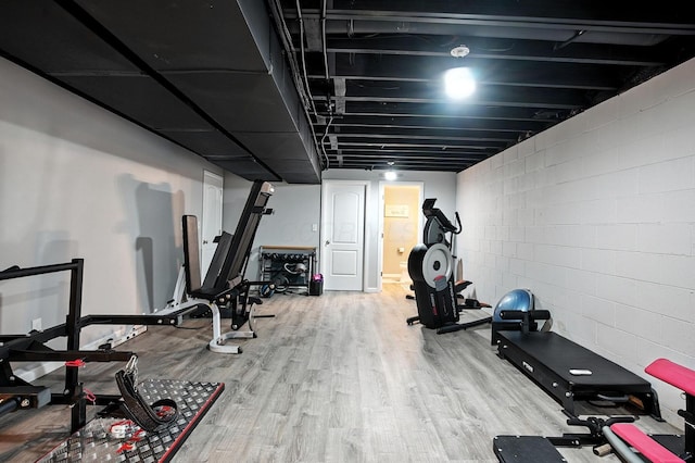 6946 Dean Farm Rd, New Albany, OH 43054 - exercise area featuring wood finished floors