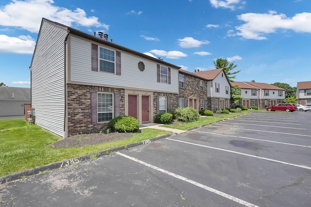 7385-7395 Cimmaron Sta, Columbus, OH 43235 - uncovered parking lot with a residential view
