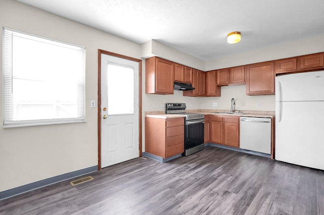 7385-7395 Cimmaron Sta, Columbus, OH 43235 - kitchen featuring electric range, freestanding refrigerator, dishwasher, under cabinet range hood, and light countertops