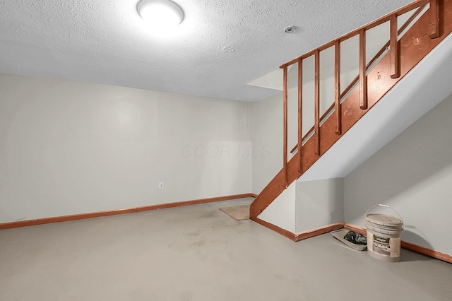7385-7395 Cimmaron Sta, Columbus, OH 43235 - basement featuring stairway and a textured ceiling