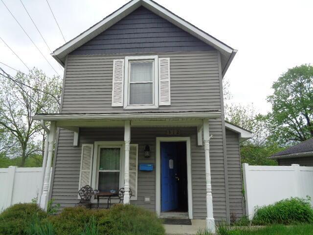 312 W William St, Delaware, OH 43015 - view of front of home featuring covered porch