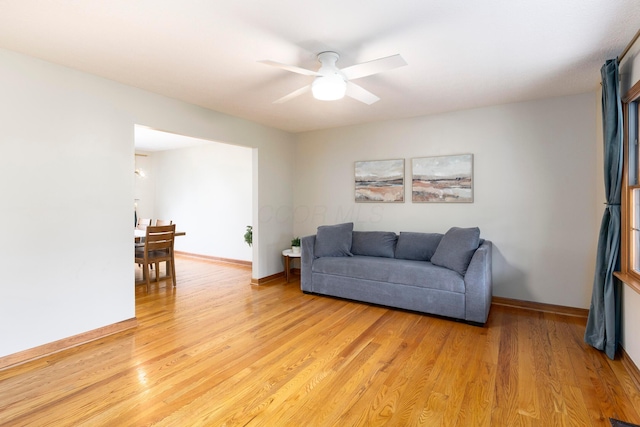 11578 Duncan Plains Rd NW, Johnstown, OH 43031 - living room with ceiling fan and light wood-style flooring