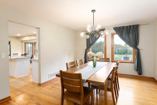 11578 Duncan Plains Rd NW, Johnstown, OH 43031 - dining space with light wood-type flooring, a chandelier, and recessed lighting