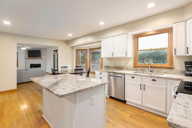 11578 Duncan Plains Rd NW, Johnstown, OH 43031 - kitchen with dishwasher, a center island, light wood-style flooring, white cabinets, and recessed lighting