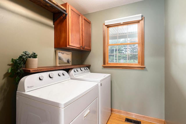 11578 Duncan Plains Rd NW, Johnstown, OH 43031 - washroom with independent washer and dryer and cabinet space