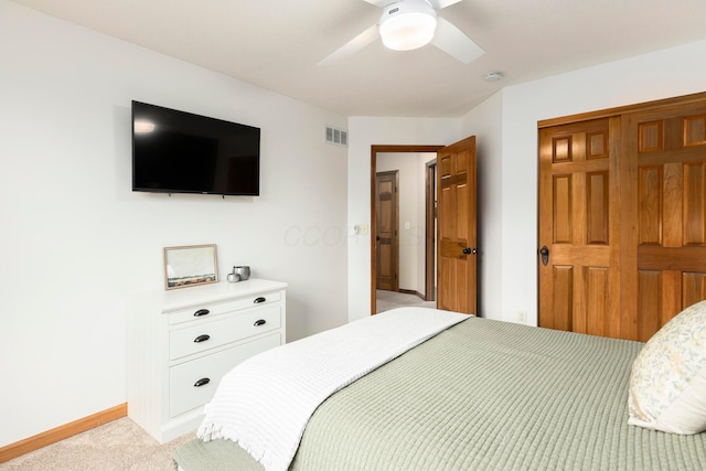 11578 Duncan Plains Rd NW, Johnstown, OH 43031 - bedroom with a ceiling fan, a closet, and light carpet