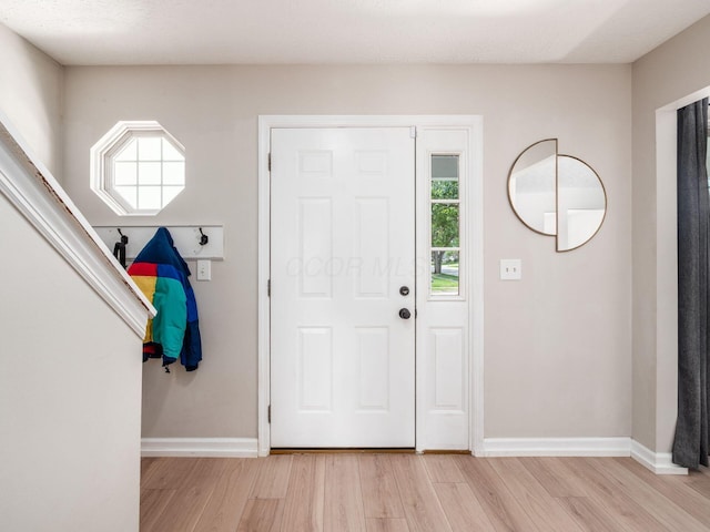 3552 Smiley Rd, Hilliard, OH 43026 - foyer featuring light wood finished floors and baseboards