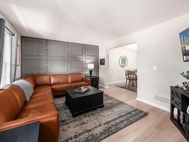 3552 Smiley Rd, Hilliard, OH 43026 - living room with light wood finished floors and baseboards