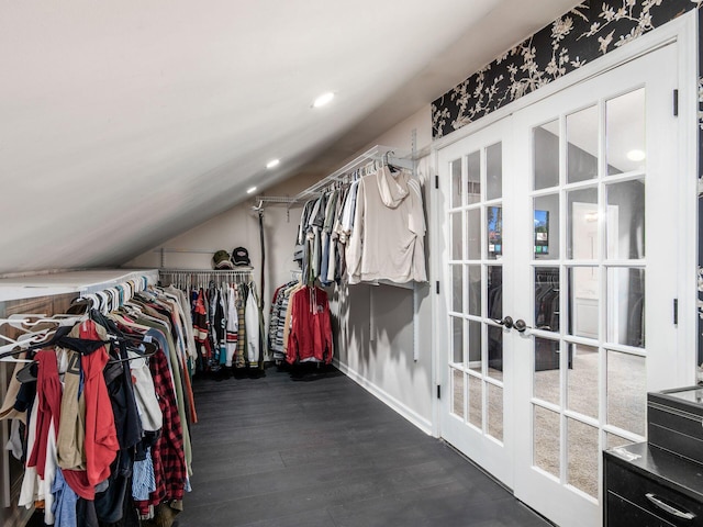 3552 Smiley Rd, Hilliard, OH 43026 - spacious closet with french doors, dark wood finished floors, and lofted ceiling