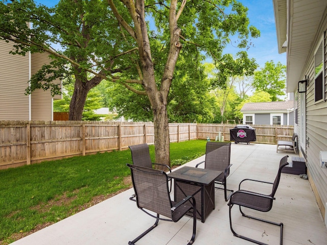 3552 Smiley Rd, Hilliard, OH 43026 - fenced backyard with a patio area