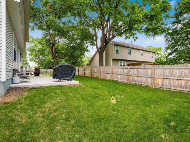 3552 Smiley Rd, Hilliard, OH 43026 - fenced backyard with a patio area