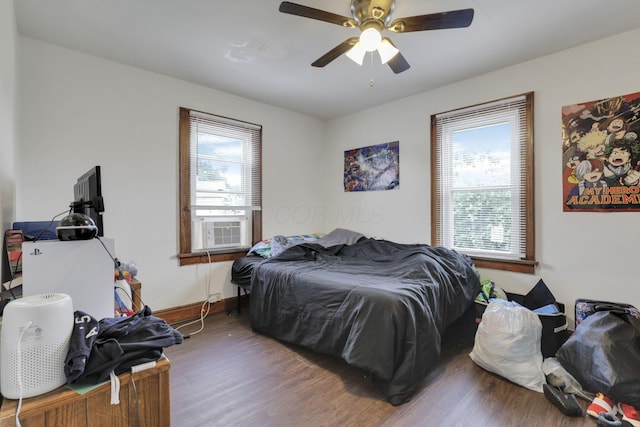 635-641 Racine Ave, Columbus, OH 43204 - bedroom with multiple windows, wood finished floors, and a ceiling fan