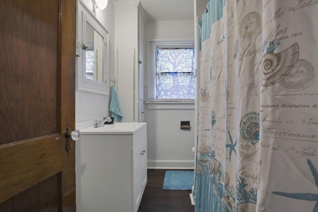 635-641 Racine Ave, Columbus, OH 43204 - bathroom featuring vanity, wood finished floors, and curtained shower