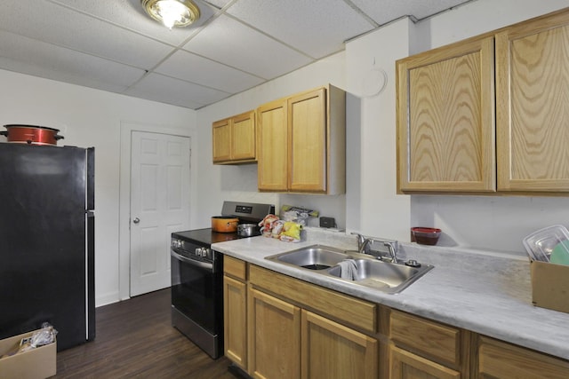 635-641 Racine Ave, Columbus, OH 43204 - kitchen featuring freestanding refrigerator, black electric range, a paneled ceiling, light countertops, and dark wood-style flooring