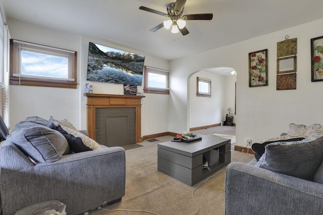 635-641 Racine Ave, Columbus, OH 43204 - living area featuring arched walkways, ceiling fan, and light carpet