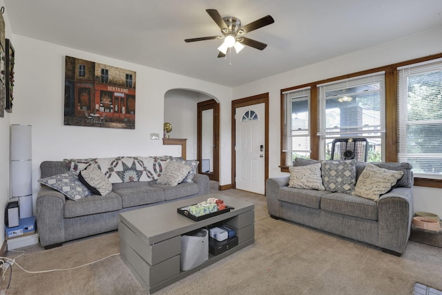 635-641 Racine Ave, Columbus, OH 43204 - living room featuring arched walkways, carpet flooring, and a ceiling fan