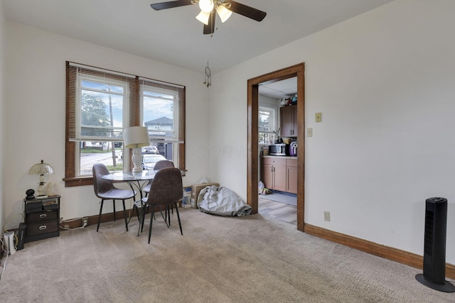 635-641 Racine Ave, Columbus, OH 43204 - dining room with light colored carpet and ceiling fan
