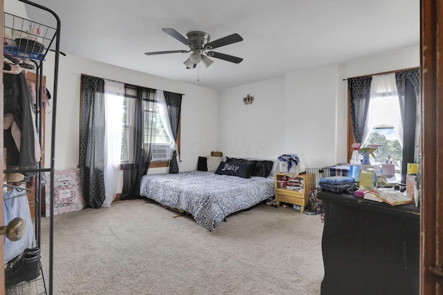 635-641 Racine Ave, Columbus, OH 43204 - bedroom with multiple windows, carpet, and a ceiling fan