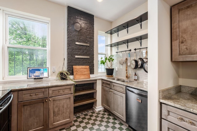 572 Linwood Ave, Columbus, OH 43205 - kitchen featuring stainless steel dishwasher, open shelves, dark flooring, and backsplash