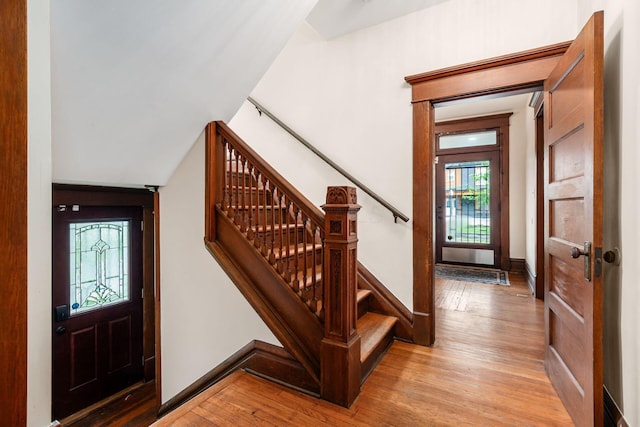 572 Linwood Ave, Columbus, OH 43205 - entrance foyer with light wood finished floors, plenty of natural light, and stairway